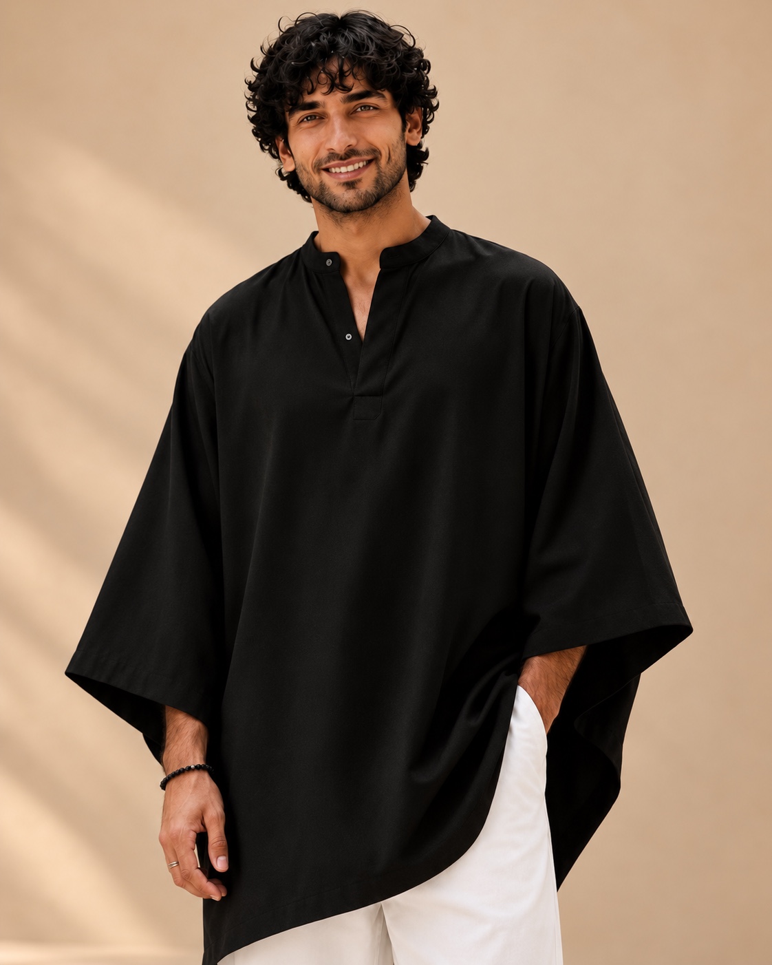 A closer look at the black kurta’s collar and generous sleeves